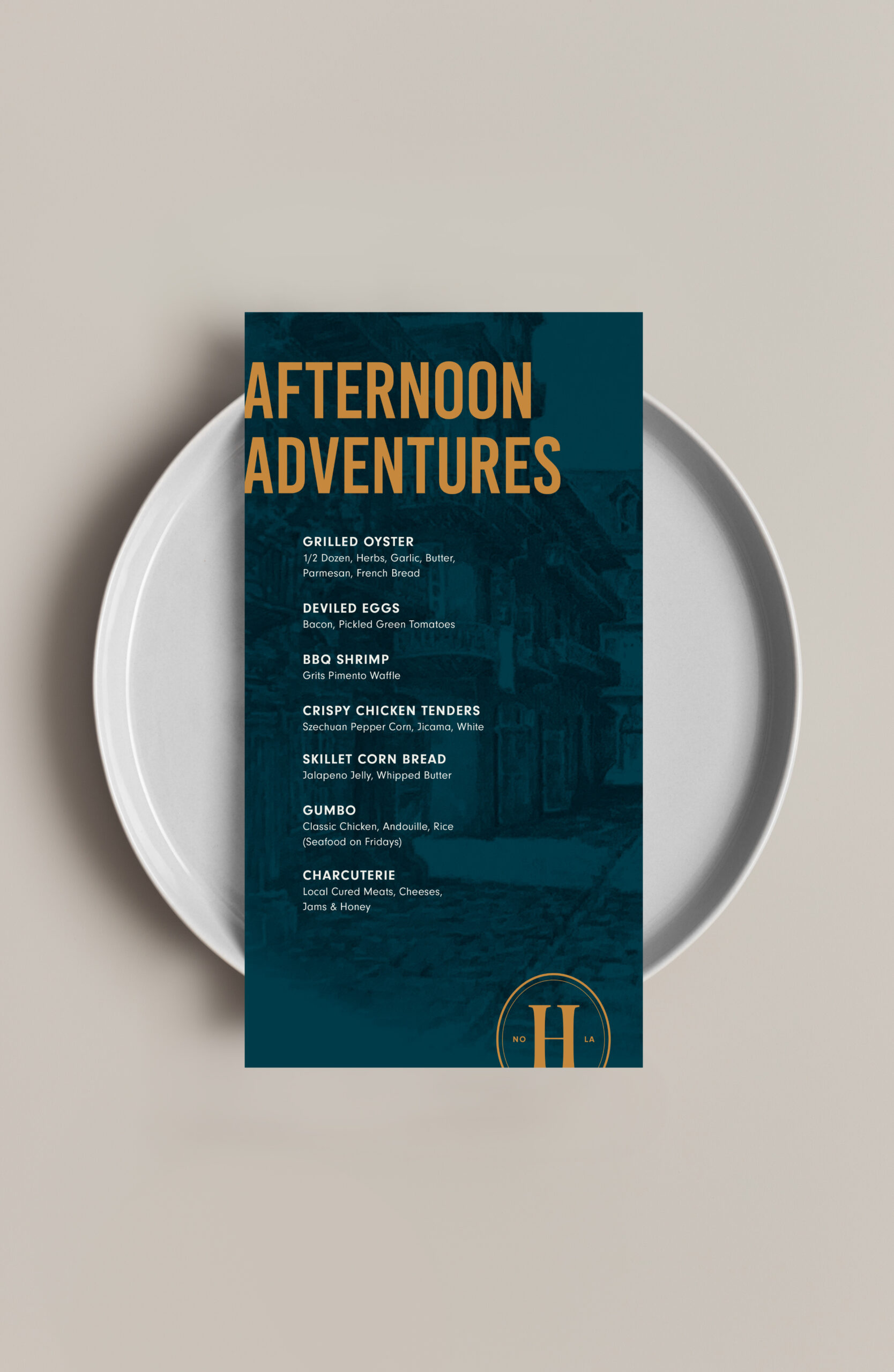 Menu titled "Afternoon Adventures" placed on a white plate, listing various food items such as grilled oyster, deviled eggs, BBQ shrimp, crispy chicken tenders, gumbo, and charcuterie.