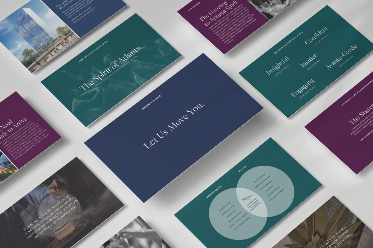 Multiple digital presentation slides are arranged diagonally on a white surface, featuring text and images with blue, teal, and purple backgrounds.