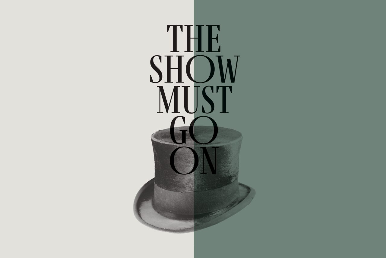 A vintage top hat is centered below the text "THE SHOW MUST GO ON" on a split background of beige and green.