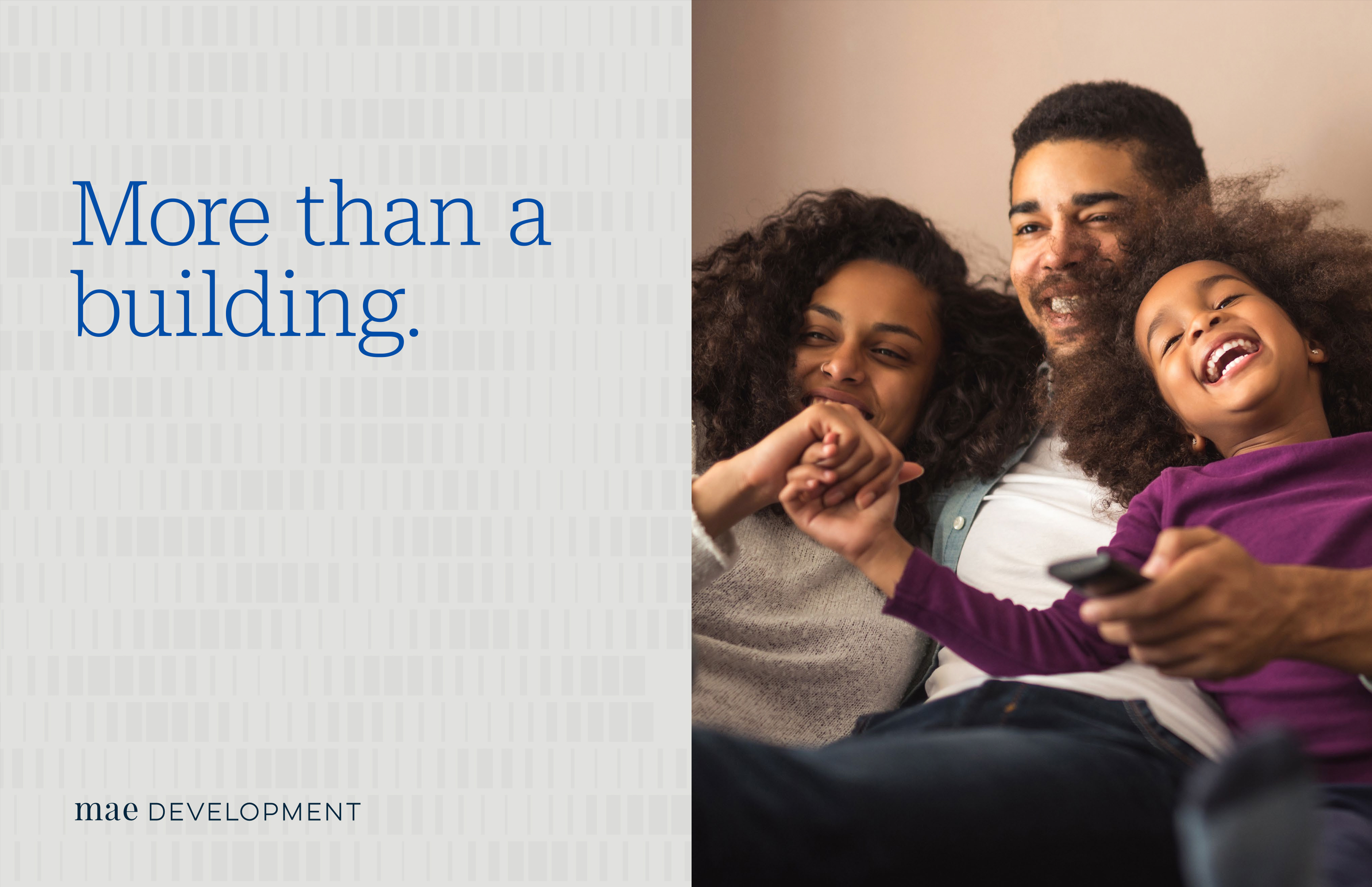A father and two daughters sit closely on a couch, smiling and laughing, next to the words "More than a building." and the mae DEVELOPMENT logo.
