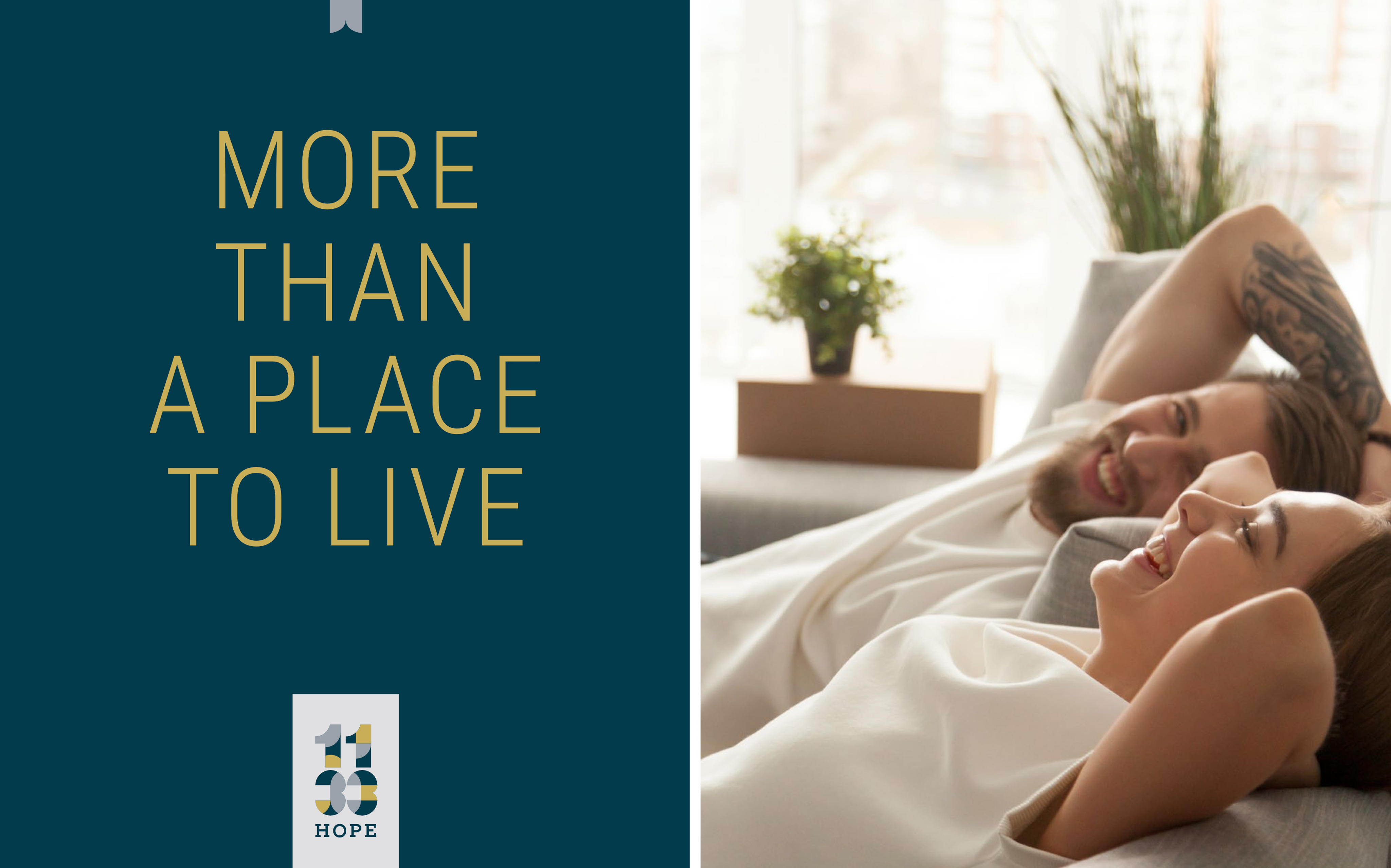 A couple relaxes and smiles on a couch in a bright living room; text on the left reads "More Than a Place to Live" above a logo labeled "Hope.