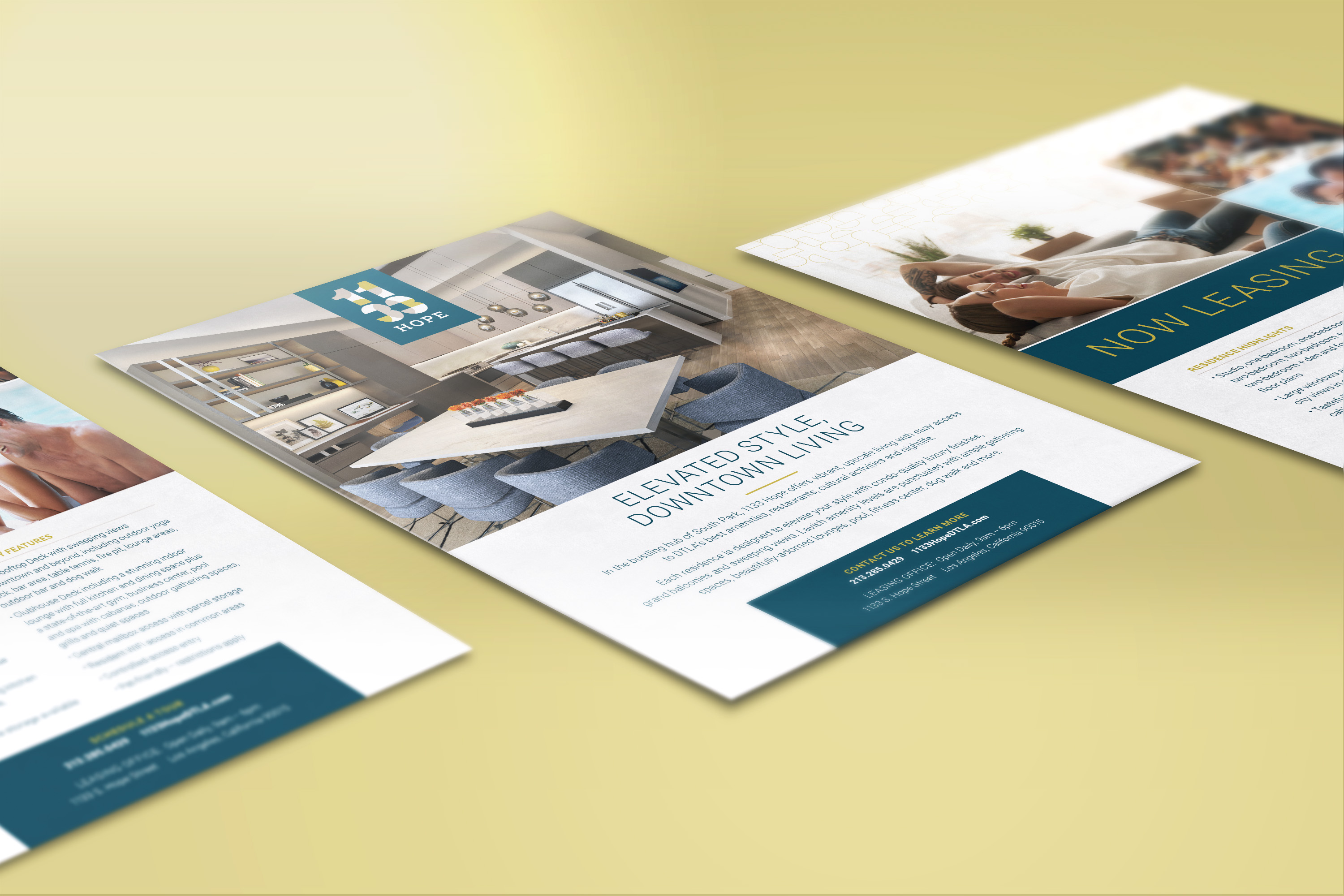 Three promotional flyers for downtown living are laid out on a light yellow surface, featuring images of interiors, people, and leasing information in blue and white designs.