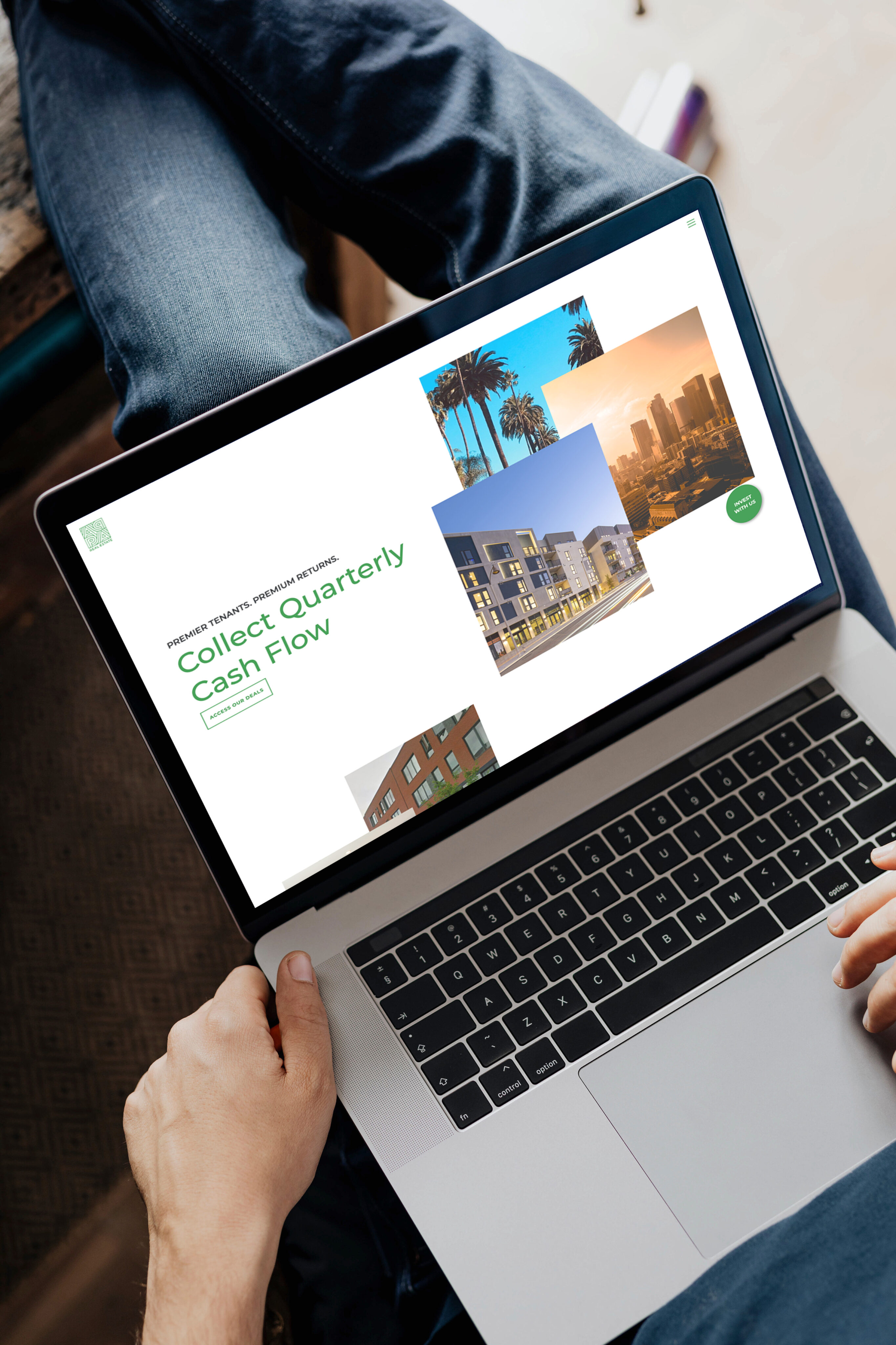 A person using a laptop displaying a website about collecting quarterly cash flow, featuring images of buildings and cityscapes.