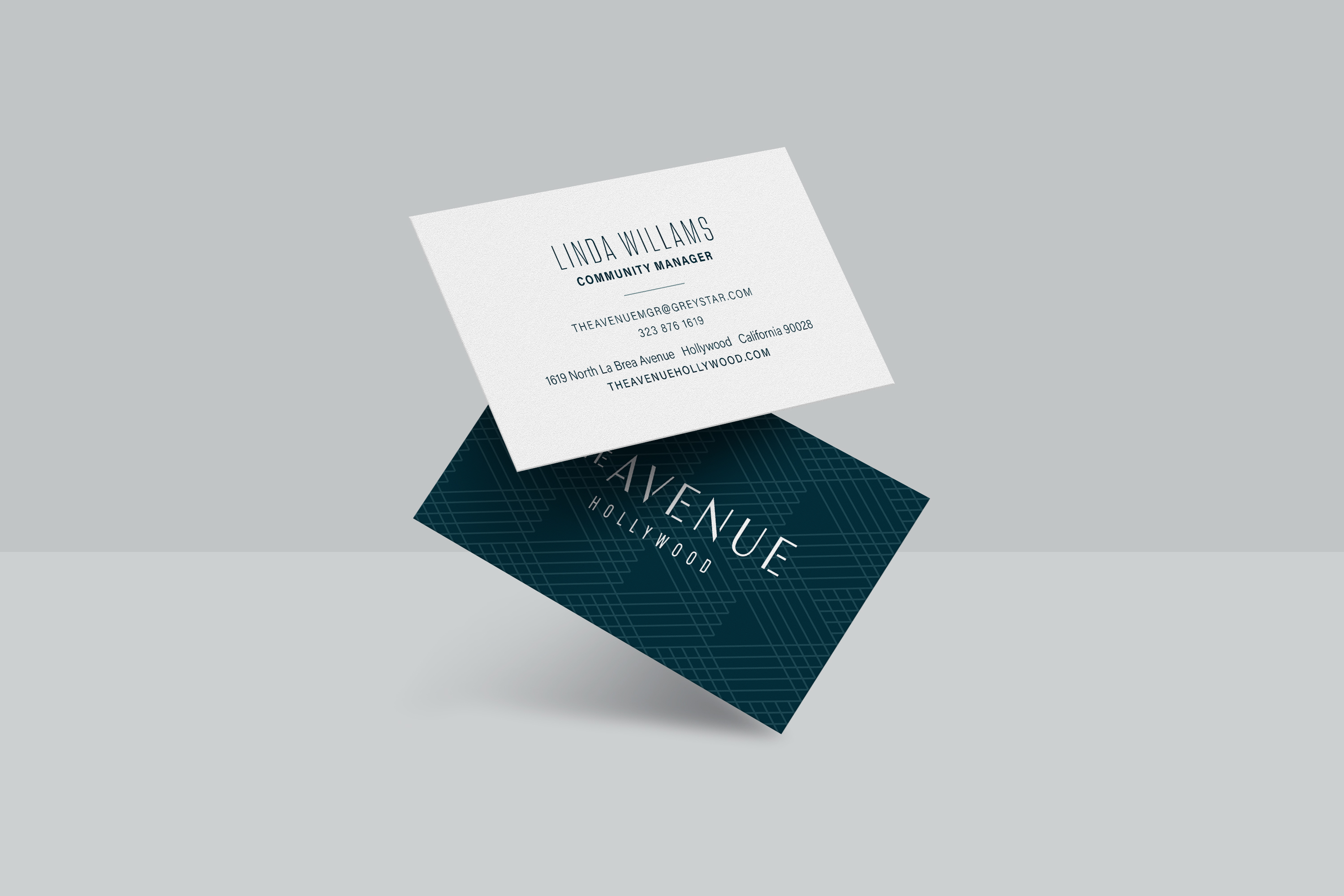 Two business cards: one showing contact details for Linda Williams, Community Manager, and one with the text "Avenue Hollywood" on a patterned dark background.