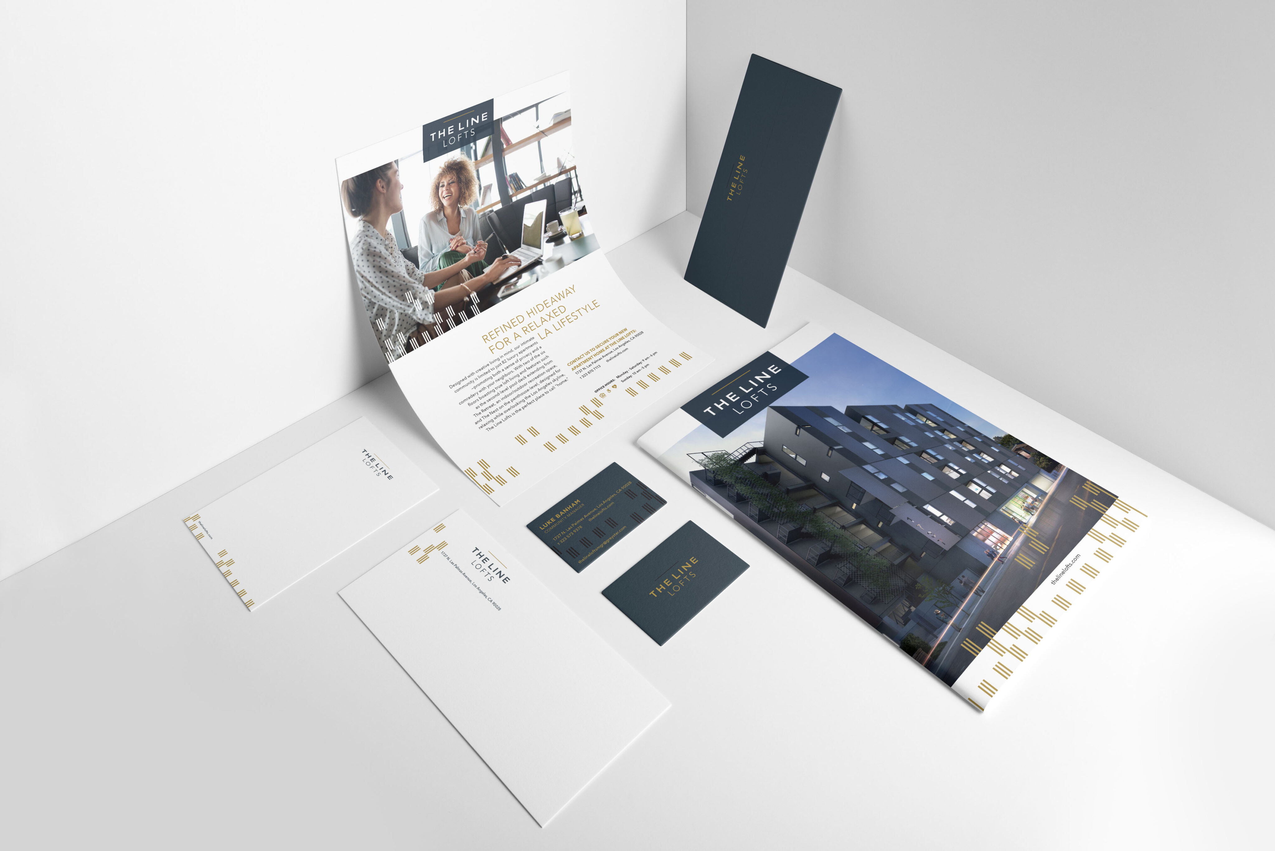 A set of branded marketing materials, including brochures, envelopes, a business card, and letterhead, arranged on a white surface with a modern, minimal design.