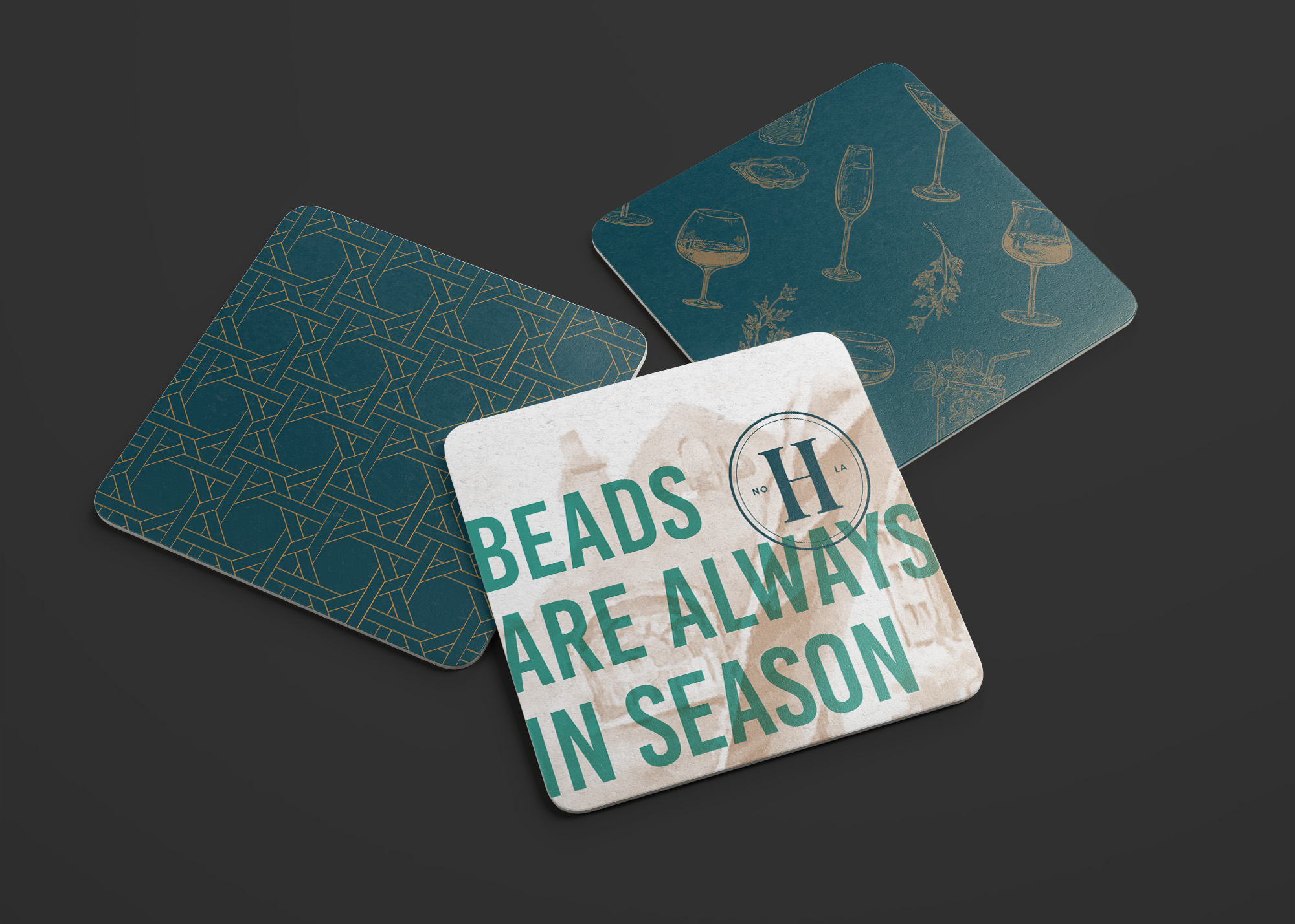 Three square drink coasters are shown. Two have abstract and drink-themed patterns, while the third has the text "BEADS ARE ALWAYS IN SEASON" and a logo with two vertical lines in a circle.