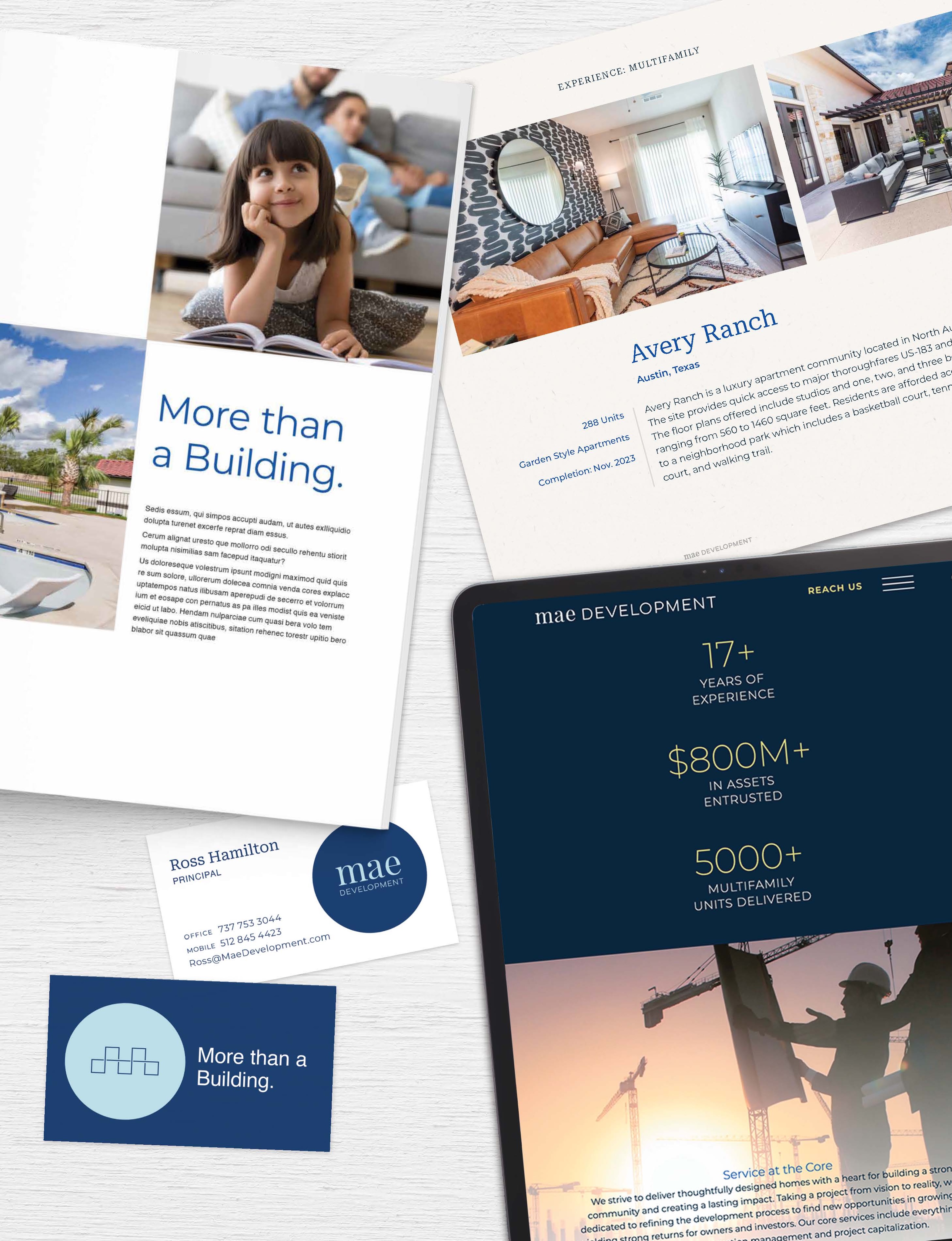A collection of marketing materials for MAE Development, including brochures, a business card, and a tablet displaying the company’s website.
