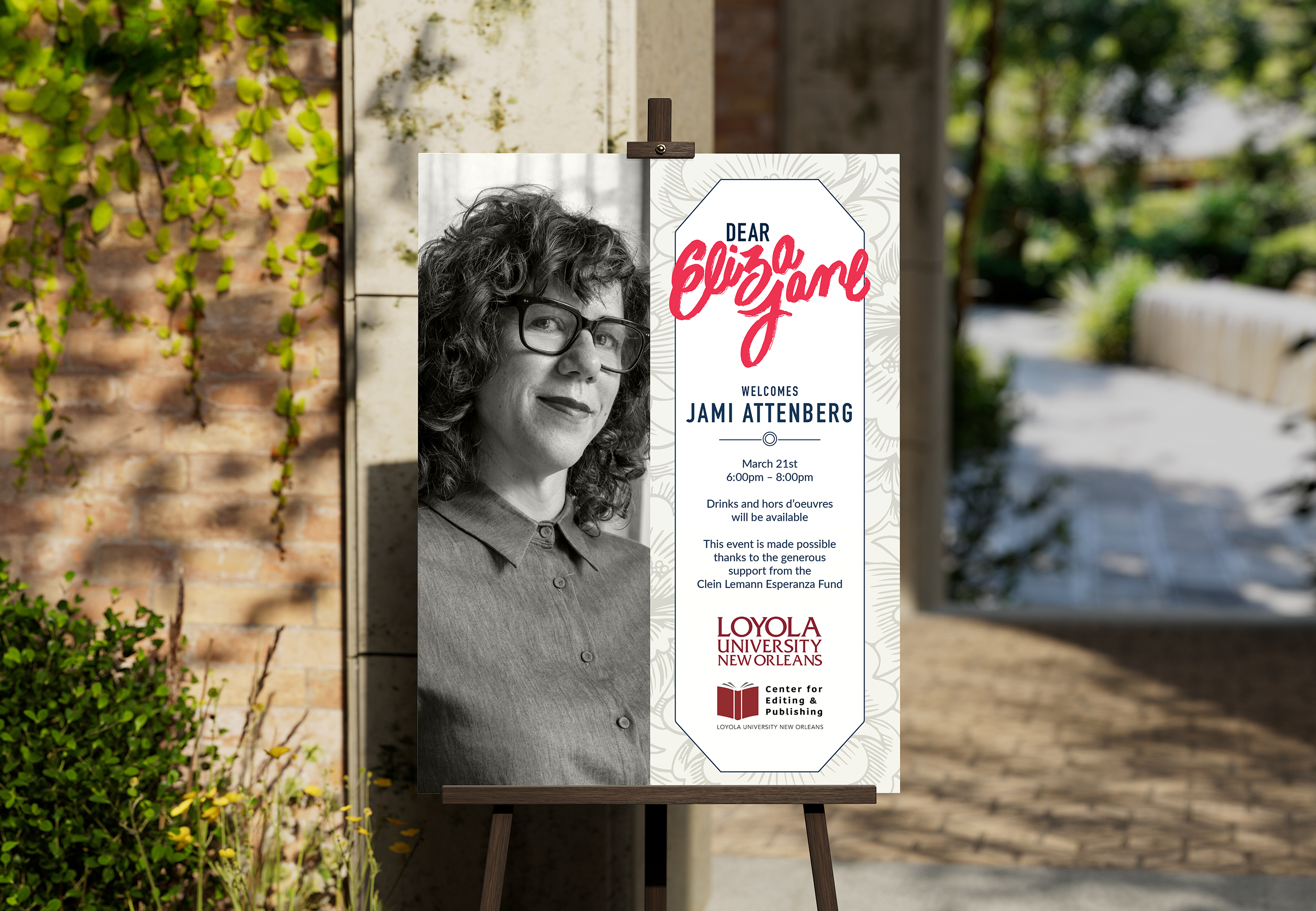 A poster on an easel announces a Jami Attenberg event at Loyola University New Orleans, featuring her photo and event details, outdoors near a brick wall and greenery.