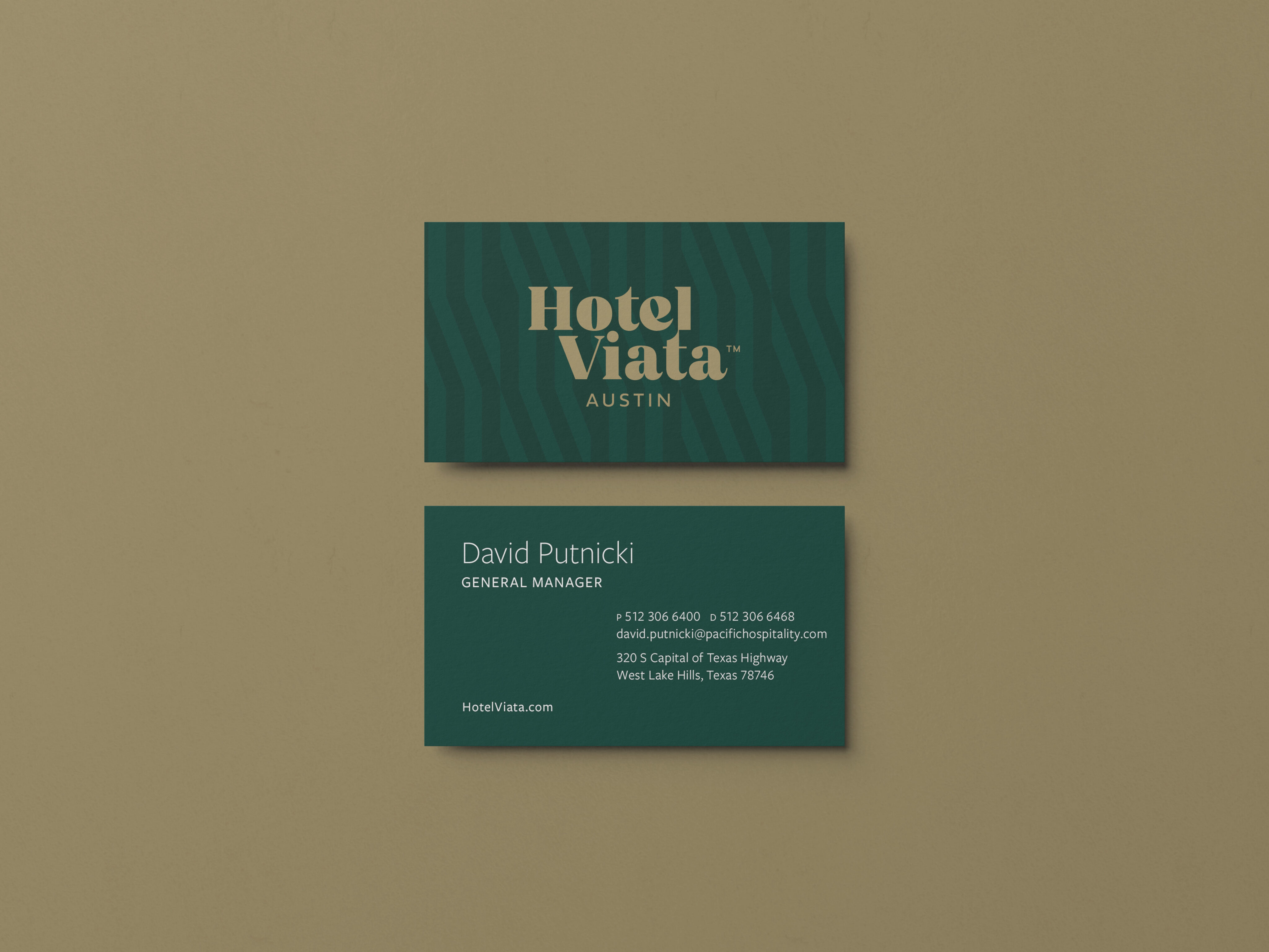 Two green business cards for Hotel Viata Austin are shown, one with the hotel logo and the other with contact information for general manager David Putnicki.