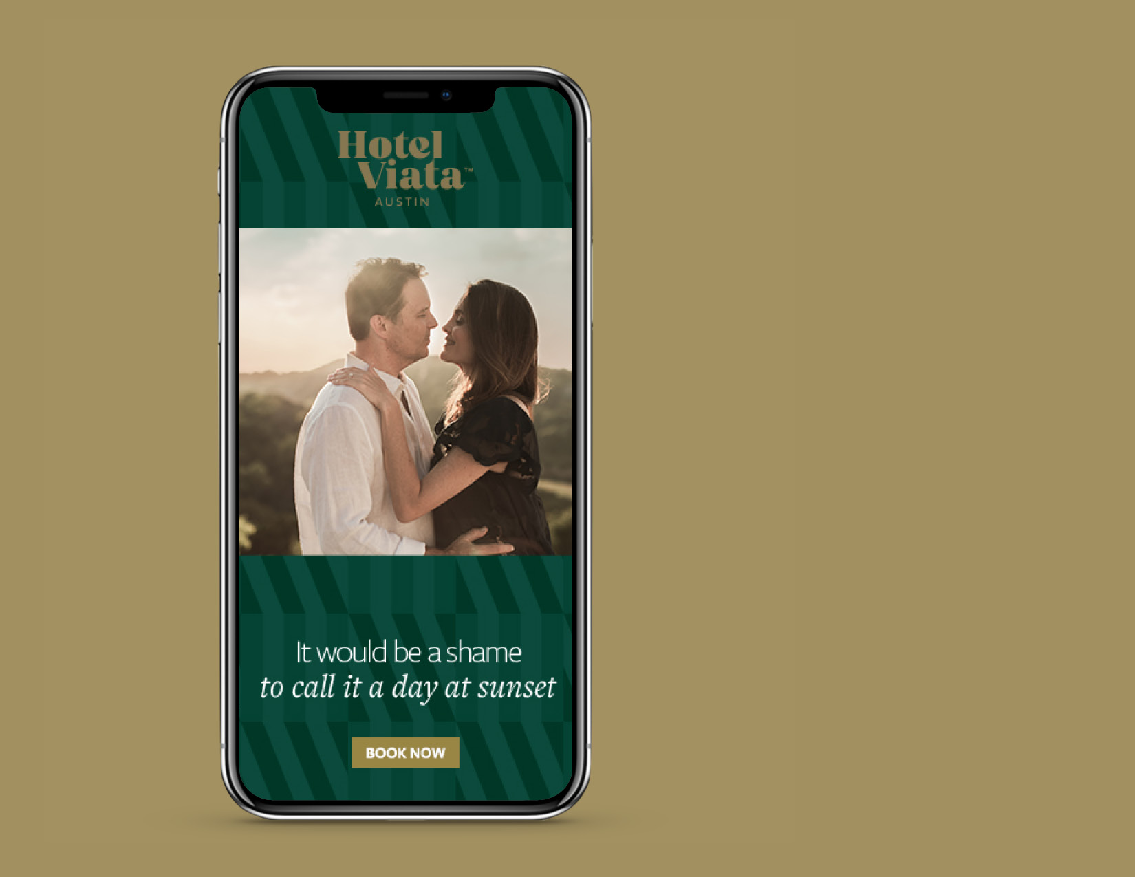 A smartphone displays a Hotel Viata Austin ad featuring a couple embracing at sunset, with the text "It would be a shame to call it a day at sunset" and a "Book Now" button.
