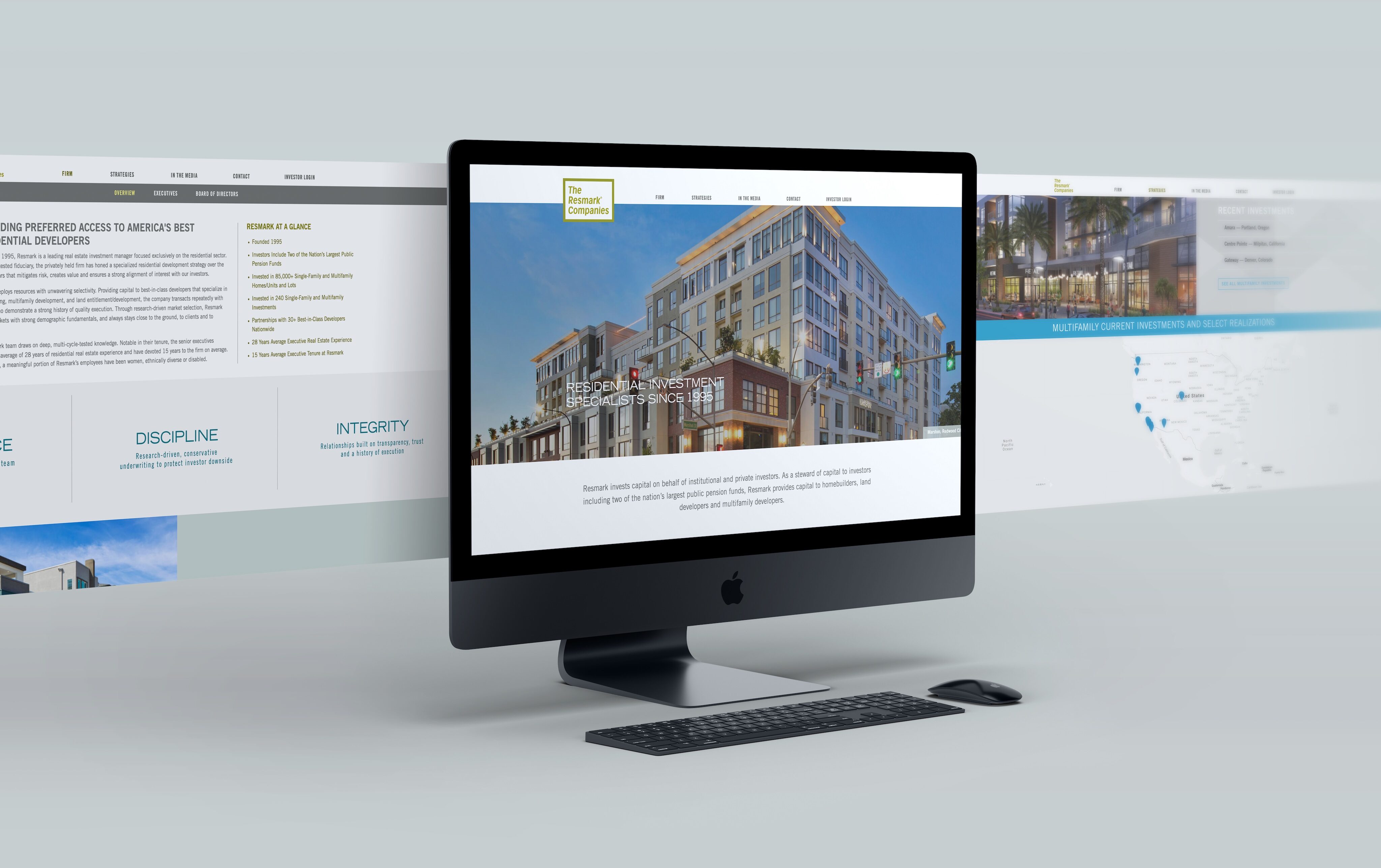 A desktop computer displays a real estate website featuring a modern building, with an extended screenshot of the website shown in the background.