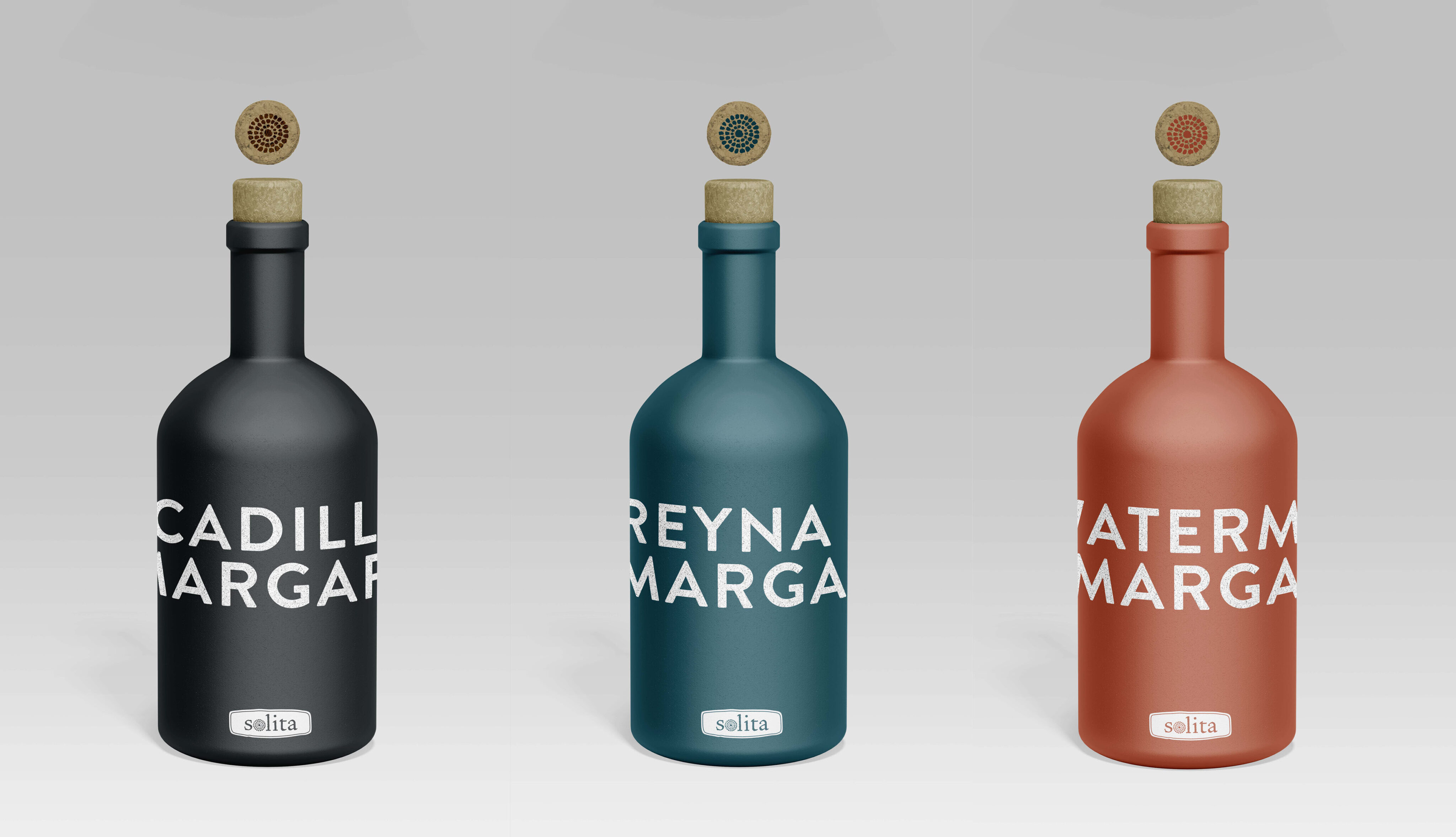 Three colored bottles with cork stoppers labeled "CADILL MARGA," "REYNA MARGA," and "WATERM MARGA" stand side by side, each with a "solita" label at the bottom.