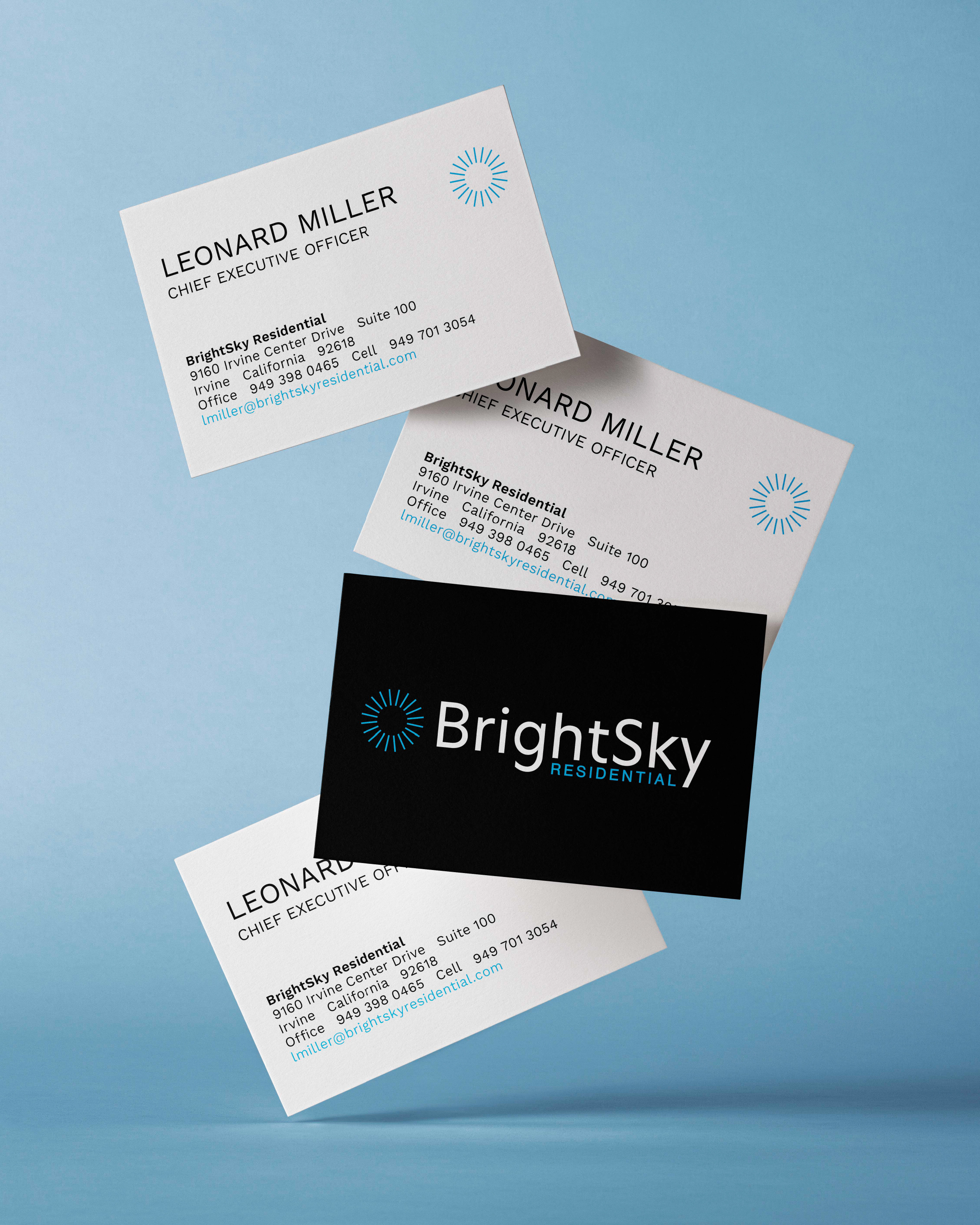 Four business cards for "BrightSky Residential," three white and one black, are arranged against a blue background. The cards display contact details and a sunburst logo.