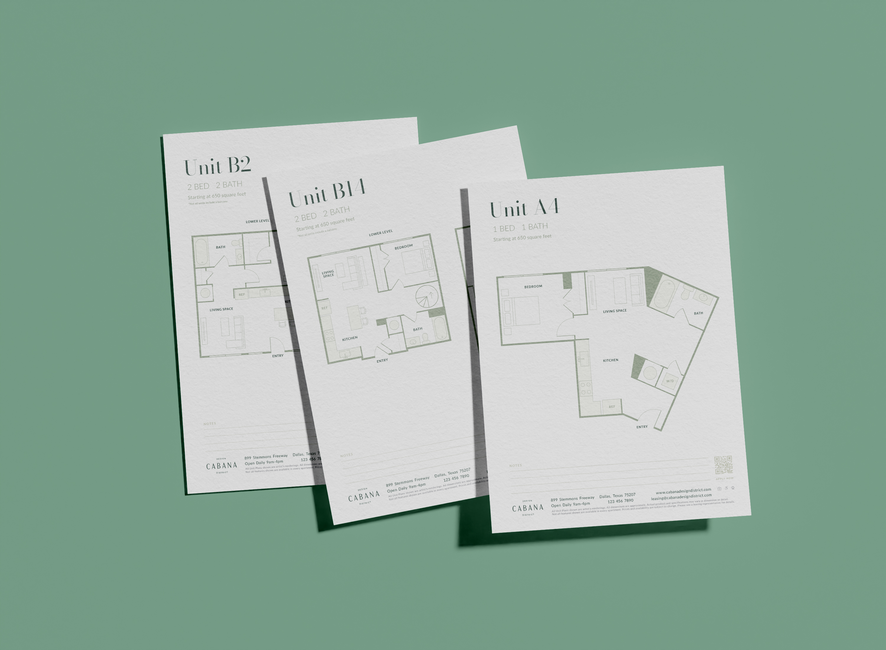 Three sheets of paper with floor plans labeled Unit B2, Unit B1, and Unit A1, each showing room layouts and details, displayed on a green background.