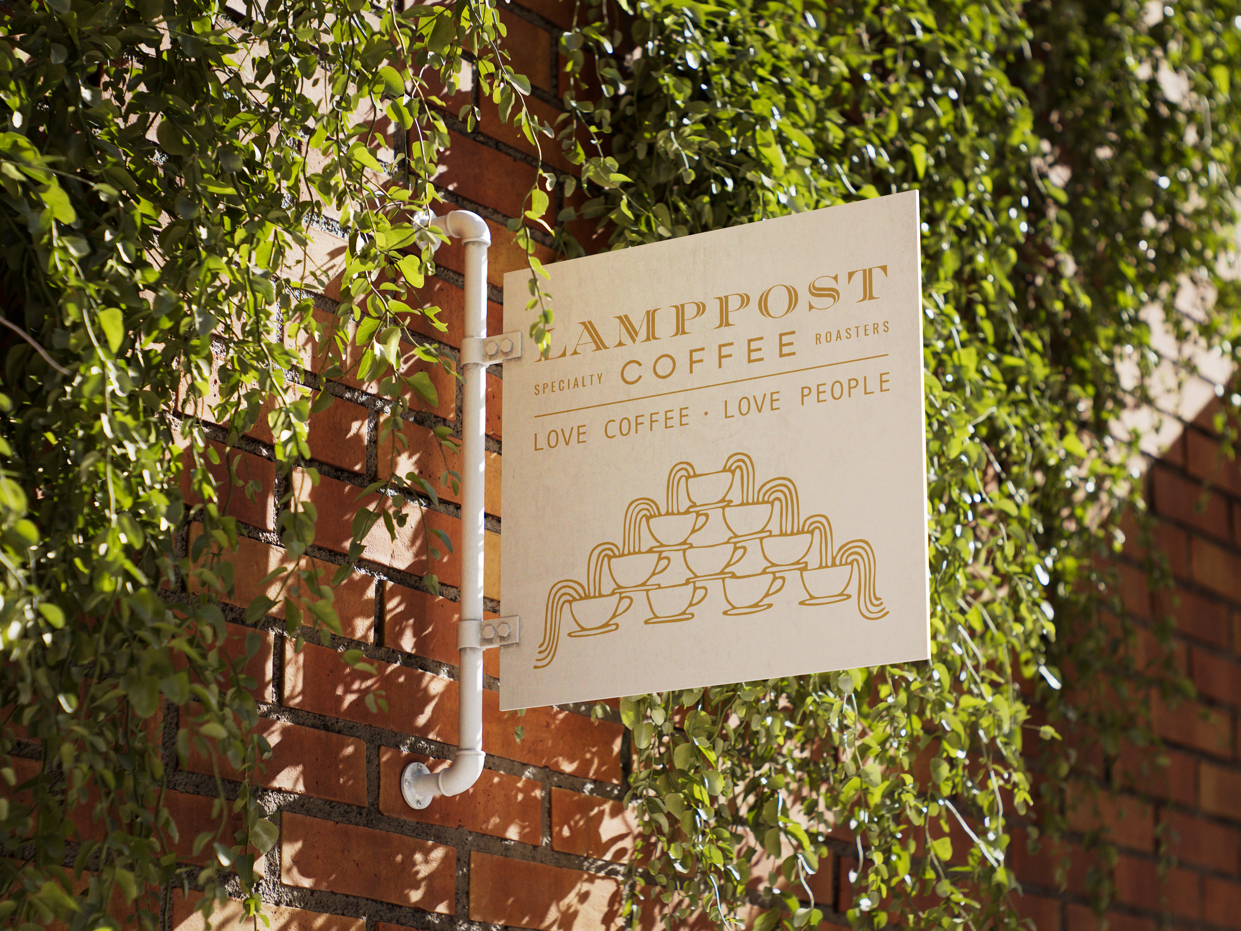 A sign for Campost Coffee Roasters is mounted on a brick wall with green vines. The sign reads "Love Coffee • Love People" and features a graphic of stacked coffee cups.